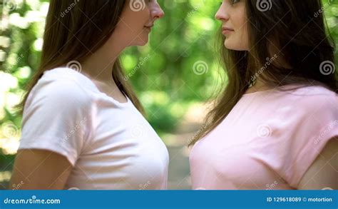 lesbian sisters kissing|two attractive lesbian girlfriends passionately kissing and。